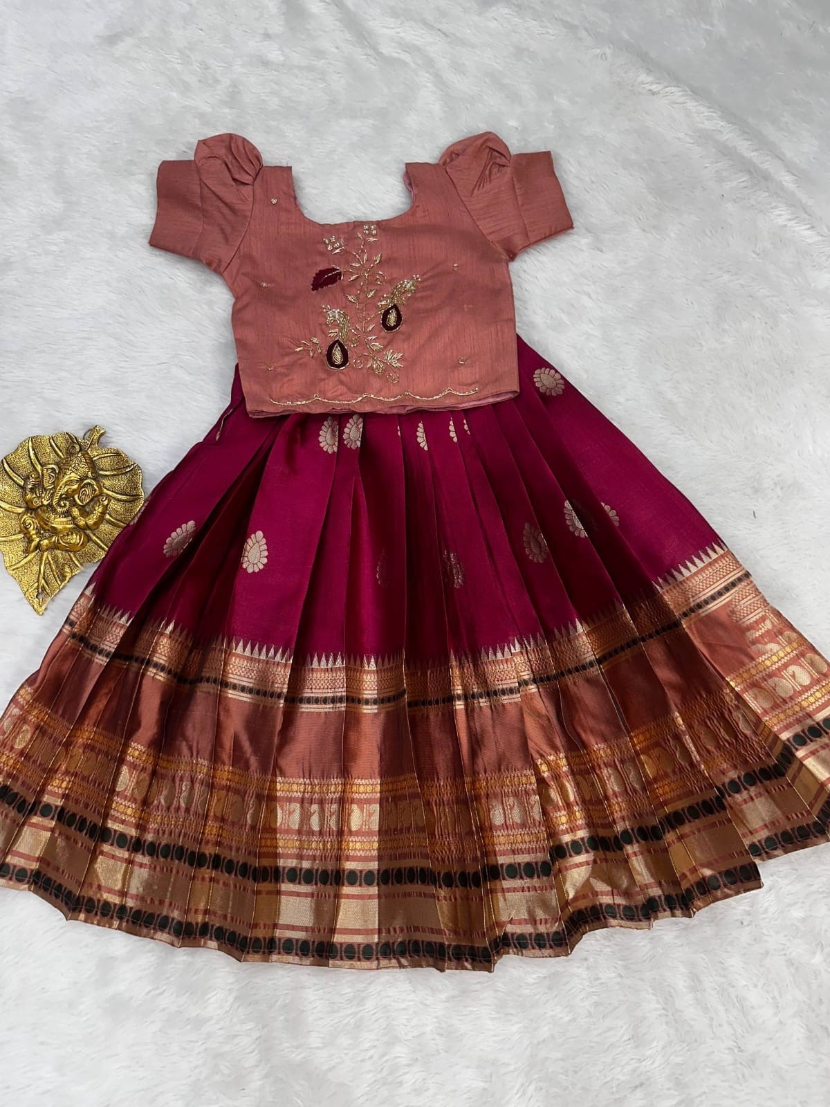 Pattu Pavadai Deep Maroon or Magenta with a gold zari